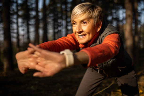 istock Smiling senior woman hands before jogging 1491249170