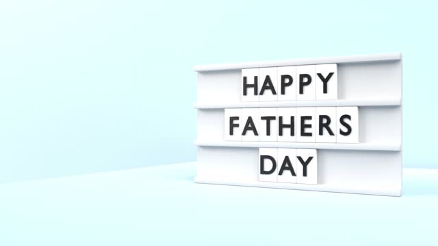 Happy Fathers Day Text is Displaying on a Light Box on Blue Background in 4K Resolution