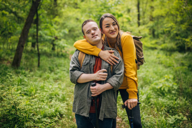 istock Portrait of two friends in the forest while hiking 1491249831