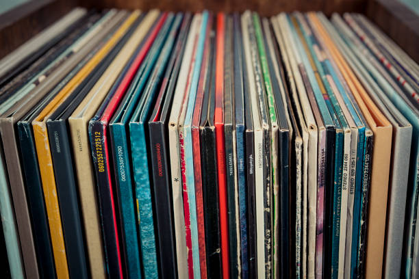 istock Vintage vinyl record on grunge background, retro toned. 1491250207