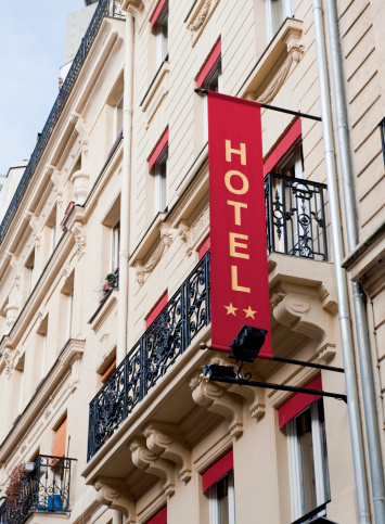 A banner outside the entrance to a Parisian Boutique hotel.