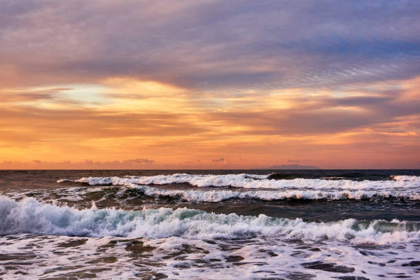 istock Scenic view of ocean with dramatic sky during sunrise 1491256146