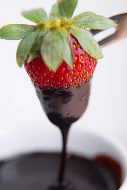 istock Strawberry dipped in chocolate fondue 1491258722