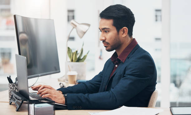 istock Laptop, office administration and business man typing on finance spreadsheet, bank software or financial accounting. Bookkeeping data, management profile and consultant problem solving payroll system 1491260396