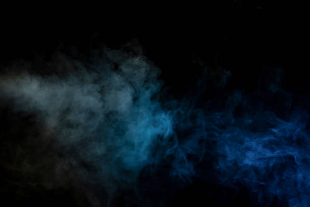 istock Blue and yellow steam on a black background. 1491260589