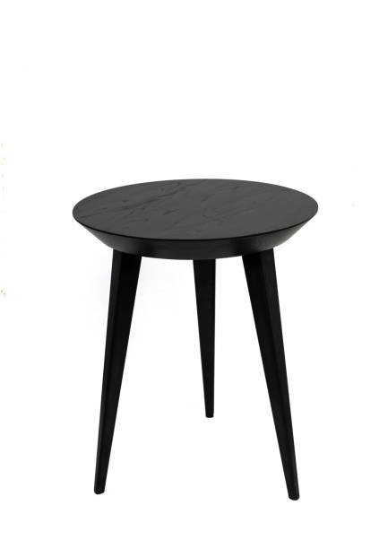 istock Round black wooden coffee table on three legs with a beautiful wood texture. Isolated on a white background 1491262110