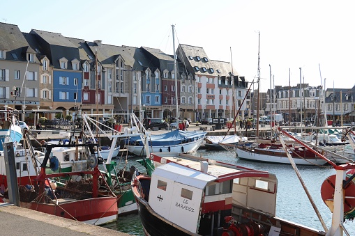 During spring holidays, on April 20th 2023 in Paimpol, Brittany, France, people visit this beautiful harbor
