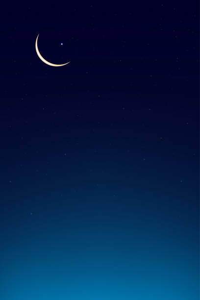 istock Eid al Adha Mubarak card,Crescent Moon on Blue Twilight Sky in Evening,Vertical Sunset after sundown,Dusk sky with copy space,Vector banner Symbol Islamic Religion for Eid al fitr, Ramadan Kareem 1491264699