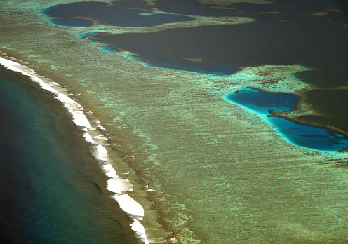Pohnpei island, Senyavin Islands, Caroline Islands archipelago, Federated States of Micronesia: Pohnpei croal barrier from the air - coral reef ecosystem, vulnerable to climate change.