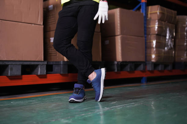 istock A shoe store worker is at a sports shoe 1491270271