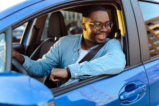 istock Cheerful male driver in the car 1491271363