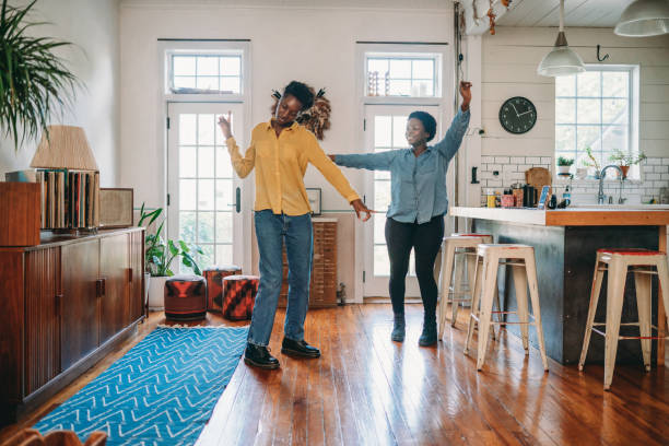 istock Two friends are having fun together dancing at home 1491274166