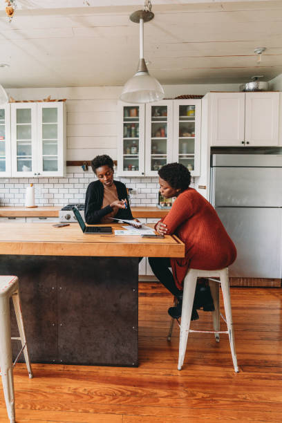 istock A financial advisor is explaining new strategies to a customer at home 1491274365