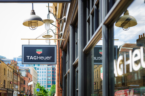 London, UK - 16 May, 2023: exterior architecture of a Tag Heuer luxury watch store in central London, UK.