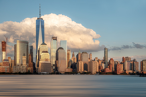 Just one bright day at Manhattan New York. The residual light from the sunset gives the World Trade Center a set of golden coating, making it more corresponding to why it's called Empire State.