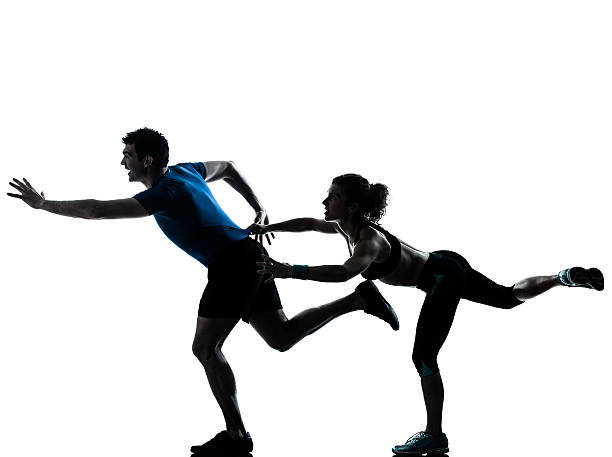istock man woman runner running jogging sprinting 149127994