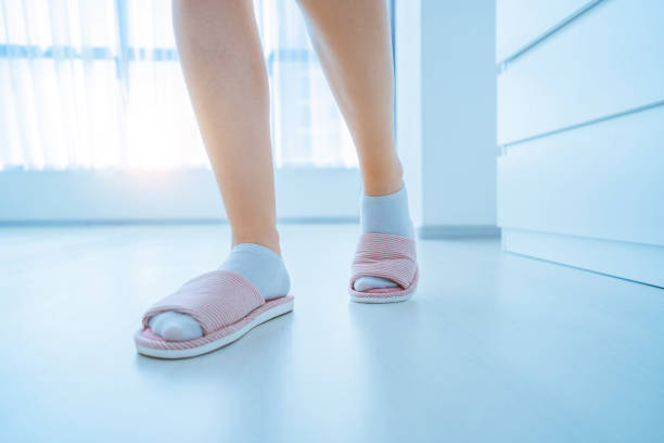 istock Female wearing cozy soft comfortable slippers 1491281873