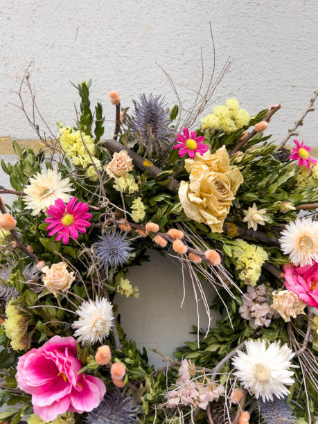 istock bouquet of flowers on wall with copy space 1491283117
