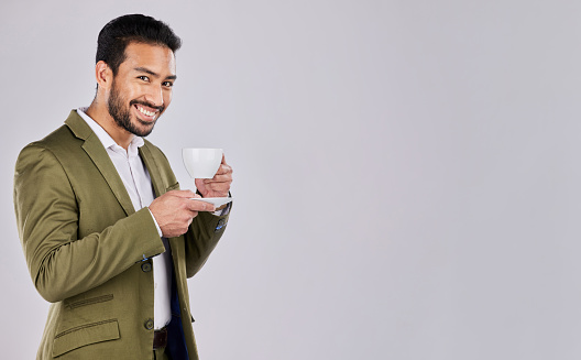 Coffee, smile and portrait of man with mockup space for product placement, advertising and marketing. Happiness, studio and happy male with latte, cappuccino and beverage in cup on white background