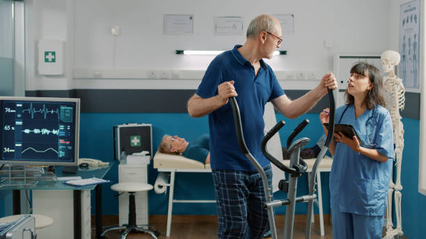 istock Old patient with mechanical disorders attending physiotherapy 1491283757