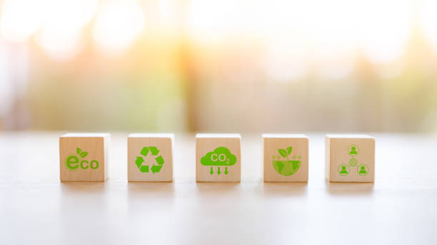 istock Reduce CO2 emission. Carbon neutral and net zero concept natural environment Climate neutral long term strategy greenhouse gas emissions target. Wooden block cubes with green net zero icon. 1491284238