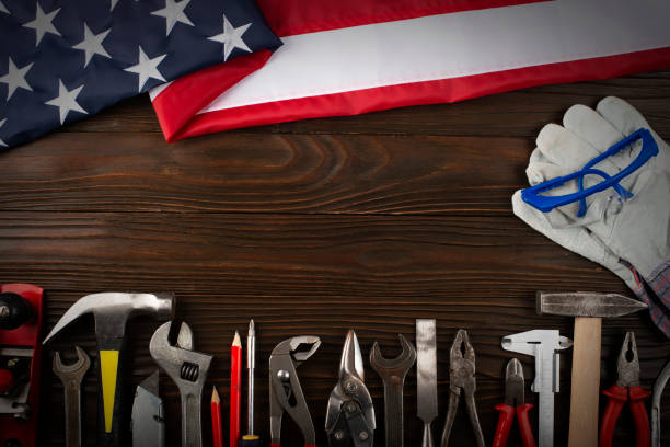 istock Tools and us flag on wooden background labor day banner mockup 1491285418