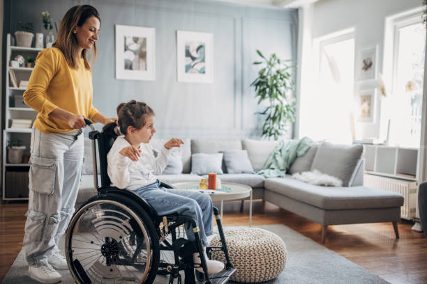 istock Mom with her disabled daughter 1491293722