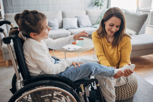 istock Mother massaging daughter's foot 1491293750