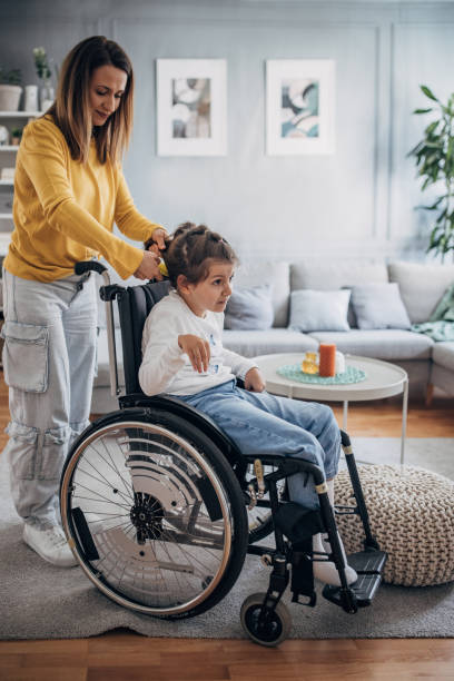 istock Mom with her disabled daughter 1491294300