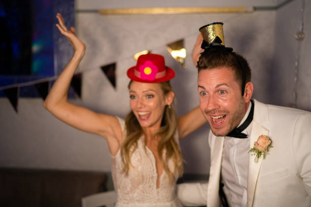 istock wedding couple having fun at party 1491296121