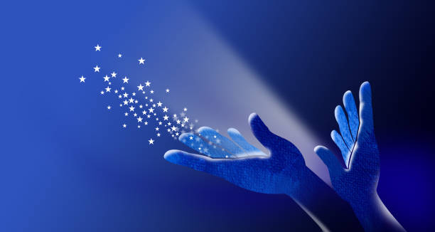 istock Hands open with magical stars abstract graphic background 1491297688