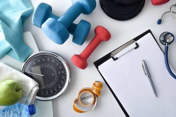 istock Nutritionist physio doctor table with equipment top view 1491297912