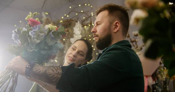 istock Two florists together create beautiful bouquet 1491305645