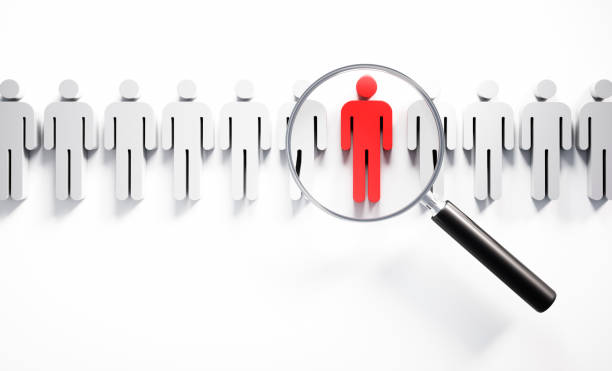 istock Magnifying glass with white and red 3D man icons 1491306307