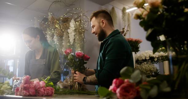 istock Two florists together create beautiful bouquet 1491306739