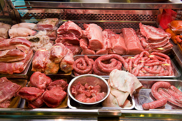 fresh raw meat for sale at a butchers shop