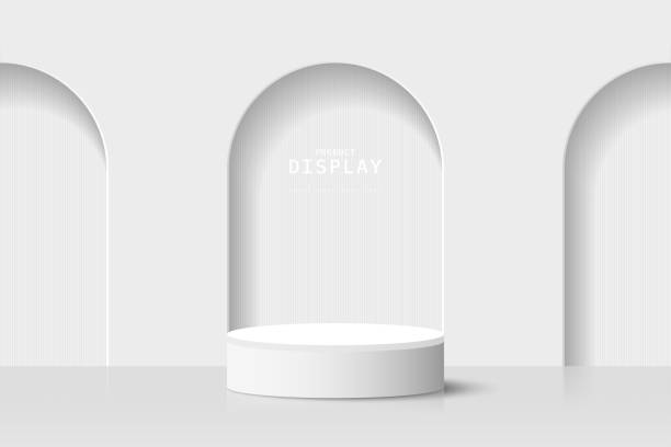 istock White gray 3d cylinder podium pedestal realistic placed in front of three arch door background. Minimal scene for mockup or product presentation, showcase. 3d vector geometric form design. 1491312190
