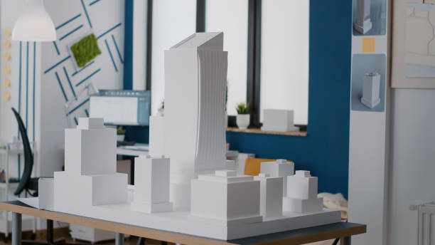 istock Nobody in architectural office with maquette to design building model and construction 1491312339