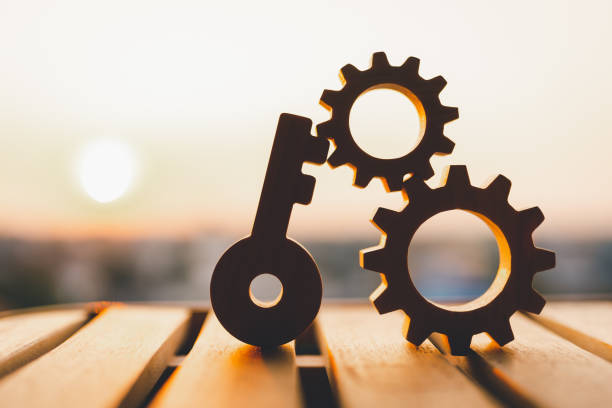 istock Key model and gear model with evening sky Key concepts for success, methods, systems of reaching goals 1491314986