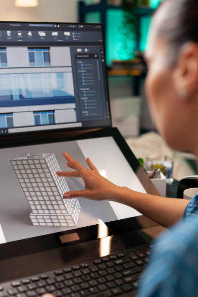 istock Professional woman architect working on building plan 1491315112