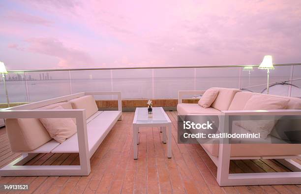 Cozy Outdoor Chairs And A Couch To Enjoy The Sunset Stock Photo - Download Image Now