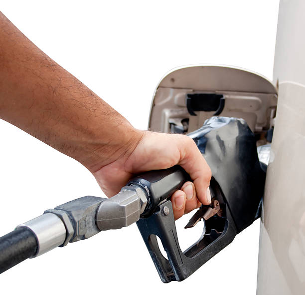 istock male hand pumping gas 149131545