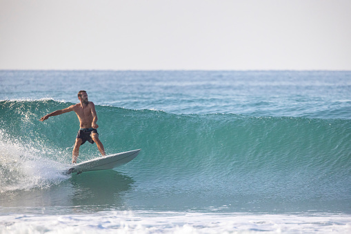 Man surfing on Ixtapa's beaches