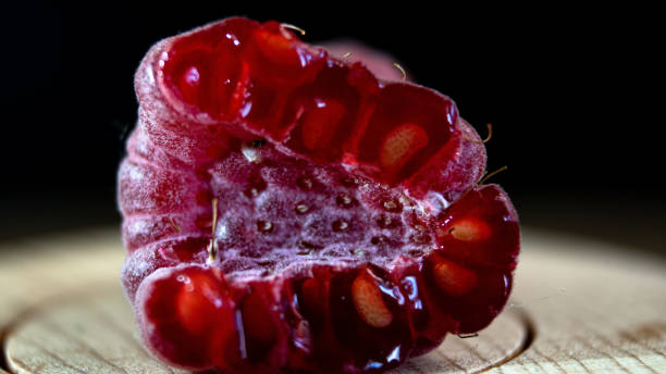 istock Close-up. Cross section of a raspberry. 1491316378