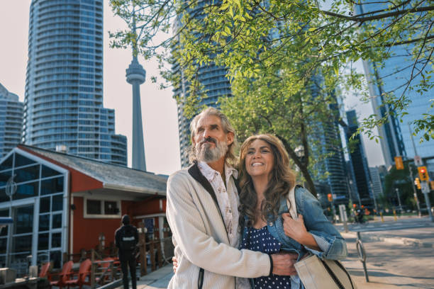 istock Senior mixed race Couple sightseeing downtown Toronto lake shore 1491317512