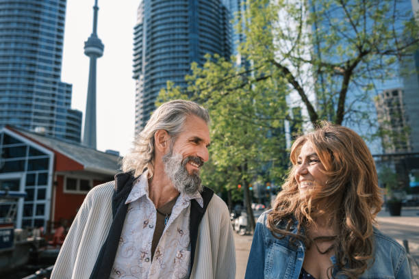 istock Senior mixed race Couple sightseeing downtown Toronto lake shore 1491317536