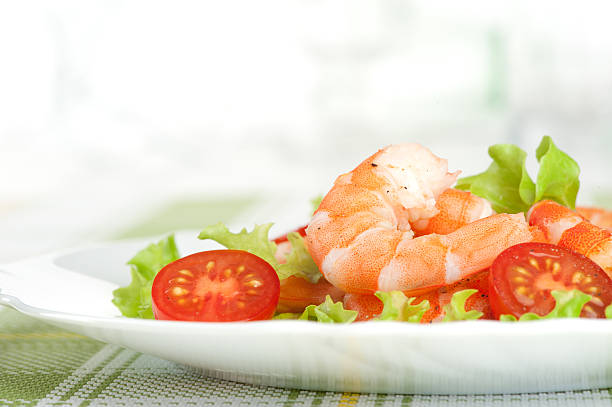 Squeeze the lemon over salad Mediterranean