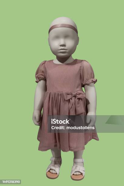 Three Mannequins Dressed In Kids Wear Stock Photo - Download Image