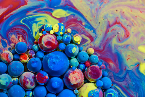 istock Rainbow surface covered in cluster of multicolored acrylic orbs 1491318440