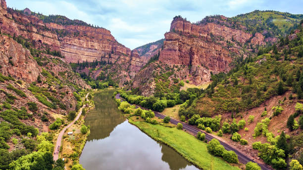 istock River and train tracks through valley in red rock mountains 1491318625